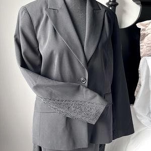 J Micheals black suit. Skirt is 12 and Jacket is a 10.